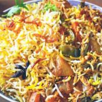 Vegetable Dum Biryani · Basmati rice cooked with mild spices and vegetables