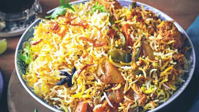 Vegetable Dum Biryani · Basmati rice cooked with mild spices and vegetables