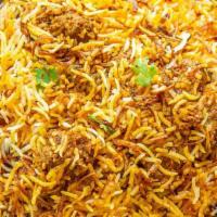 Goat Dum Biryani · Basmati rice cooked with goat pieces and many spices/flavors