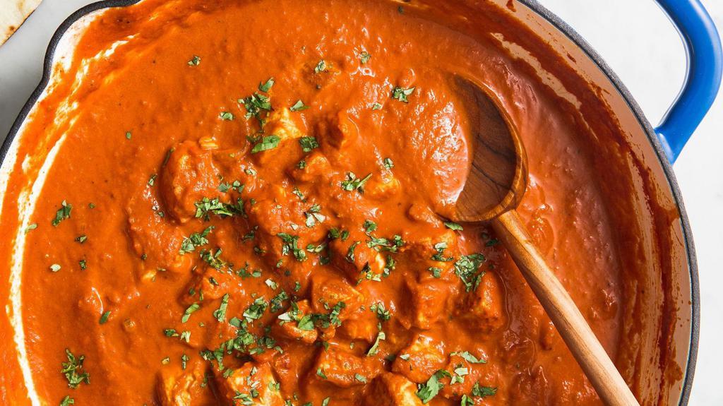 Chicken Tikka Masala · Boneless Chicken pieces cooked with curry sauce, cream and spices