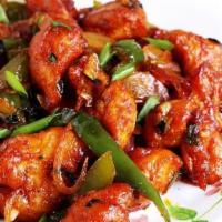 Chili Chicken · Fried boneless chicken pieces sauted with onions, bell peppers, ginger, garlic, herbs in soy...