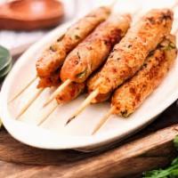Chicken Seekh Kebab · Kebabs made from chicken, masalas and seasoning and grilled golden