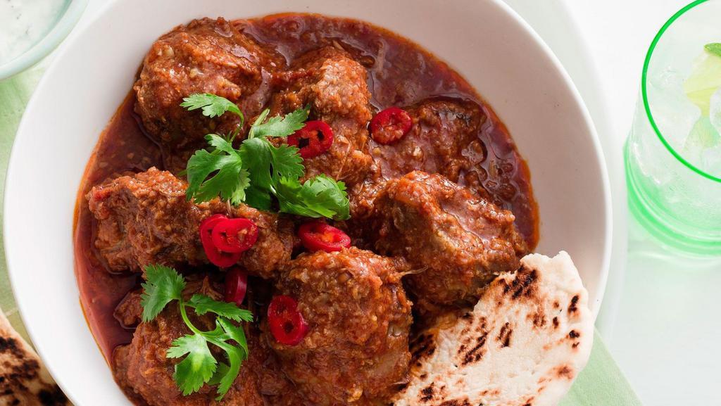 Goat Vindaloo · Goat marinated and cooked in chillies, vinegar, garlic and spices