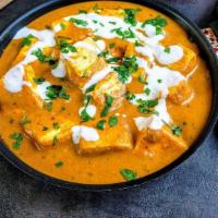 Paneer Butter Masala · Cottage cheese cooked with tomatoes, onions, bell pepper- and a blend of Indian spices