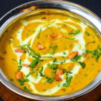 Navratan Korma · Mixed vegetables cooked in creamy sauce and spices