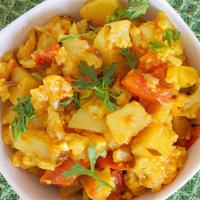 Aloo Gobi Masala · Potato and cauliflower pieces cooked with curry sauce