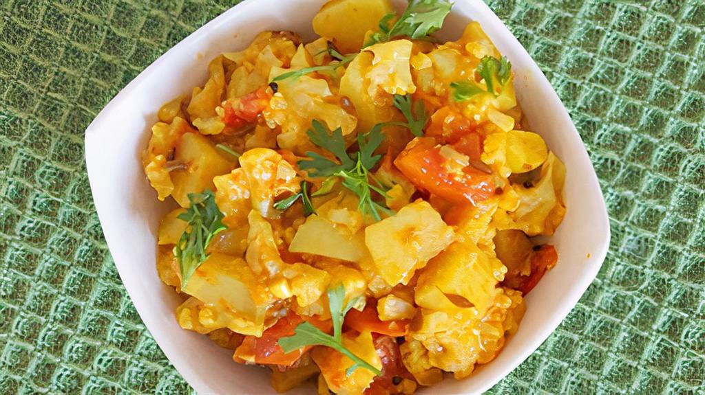 Aloo Gobi Masala · Potato and cauliflower pieces cooked with curry sauce
