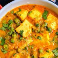 Mutter Paneer · Cottage cheese cooked with green peas and a blend of Indian spices