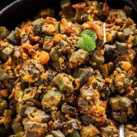 Bhindi Masala · Okra deep fried and then sautéed with onions, garlic and spices
