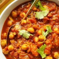 Chana Masala · Chick peas cooked with tomatoes, onions and spices
