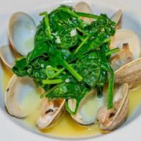 Steamed Clams · Garlic white wine sauce, spinach. Six pieces.