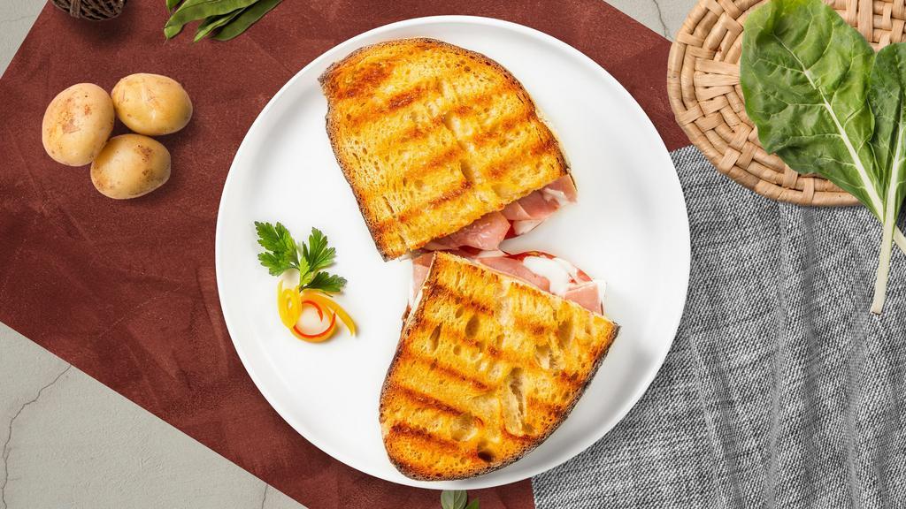 Ham & Turkey Panini · Boar's Head roast beef and turkey ham served on a flat panini bread.