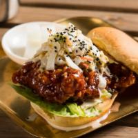 Ksg-Wich (Korean Sweet Gochujang) · Korean sweet gochujang (KSG) crispy chicken, white kimchi slaw, and sesame seed. Peanut in K...