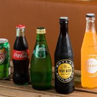 Soda · Coke, diet coke, ginger ale, orange soda, and root beer.