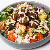 Falafel Bowl · Salad Bowl with your choice of greens, salad bar items, sauces and topped with our specialty...