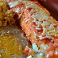 Burrito Colorado  · A large flour tortilla filled with chile colorado, topped with red burrito salsa and cheddar...