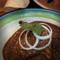 Mole Poblano · Marries mulato ancho, y chiles pasilla con las especias calientes crean una salsa suave idea...