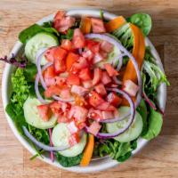 Garden Salad · Mixed Greens, Tomatoes, Cucumber, Onions & Carrots