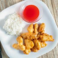 Sweet & Sour Chicken · Served with white rice and sauce on the side.