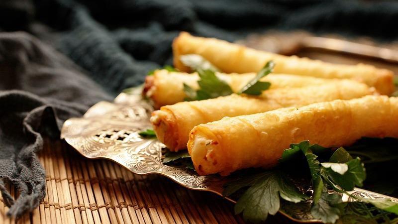 Sigara Borek · Pan-fried phyllo rolls stuffed with Feta cheese and parsley.
