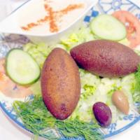 Kibbeh · Icli Kofte - Wheat bulgur stuffed with seasoned ground lamb and pine nuts