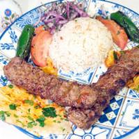 Adana Kebab · Slightly seasoned hand chopped lamb , flavored with red bell peppers