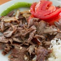 Doner Kebab ,  Come  Free Dessert  Baklava · Doner kebab is a type of kebab, made of meat cooked on a vertical rotisserie. Seasoned meat ...