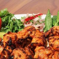 Chicken Shish Kebab · Tender chunks of chicken , marinated with Chef`s own blend of herbs and spices