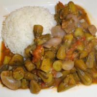 Okra Stew · Baby okra baked with fresh tomatoes , green and red pepper and carrots , served with rice.