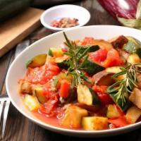 Vegetarian Casserole · A fine mixture of potatoes , carrots , zucchini , eggplant , white onions, red pepper, and g...