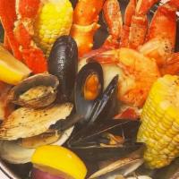 Crab Pot · 1 lb total of assorted Crabs served with Clams, Mussels, Shrimp, Corn and Potatoes, seasoned...
