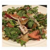 Fattoush Salad · Number two salad in the middle East. Tomato, cucumbers, radish, onions, fresh mint, lettuce,...