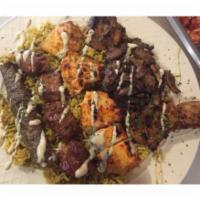 Mixed Grill · A real fiesta combination of shish kabobs and shawarma (lamb shish, chicken shish, lamb kaft...