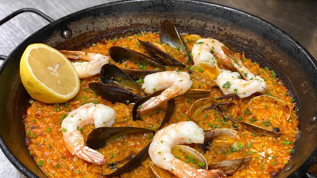 Paella For Two · Paella, two sides and flan.