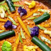 Paella De Vegetales · Gluten free. Classic Spanish bomba rice, sofrito, saffron, baby zucchini, eggplant, baby car...