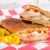 Chicken And Pesto Hot Sub · Grilled chicken with fresh mozzarella melted, and roasted pepper, sun-dried tomatoes, pesto,...