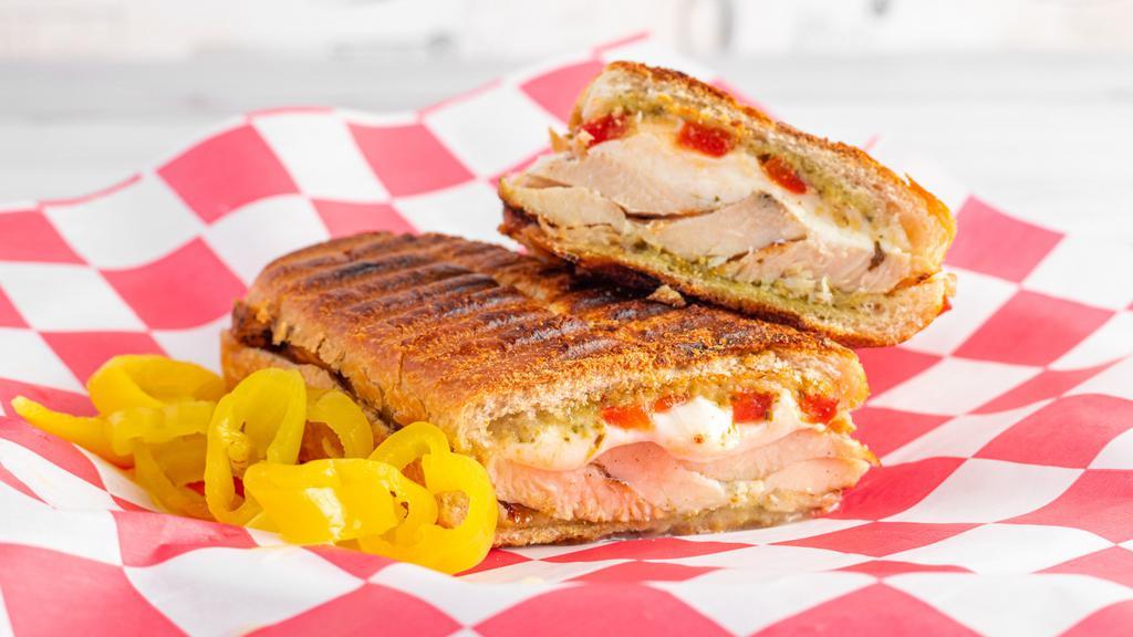 Chicken And Pesto Hot Sub Meal · Grilled chicken with fresh mozzarella melted, and roasted pepper, sun dried tomatoes, pesto, and olive oil. Add extra meat and extra cheese for an additional charge.