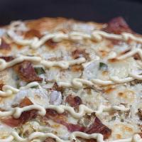 Okonomiyaki Pizza · Our unique pizza is straight from the city markets of Tokyo, if you have ever had okonomiyak...