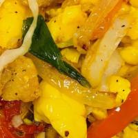 Ackee & Saltfish · Served with rice and peas or white rice, mixed vegetables, and plantains.