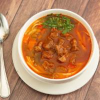 Lagman Soup · Beef and vegetable soup with noodles.