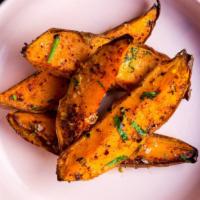 Aleppo-Roasted Sweet Potatoes · Gluten-free, vegan. lemon oil and parsley.