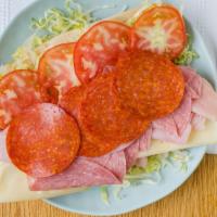 Italian Hero Sandwich · Genoa salami, pepperoni, ham, provolone cheese, lettuce, tomato oil, and vinegar on a hero. ...