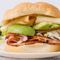 Wild Turkey Sandwich · Cracked peppermill turkey, muenster cheese, avocado, lettuce, tomato, and mustard. Made with...