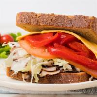 Farmingdale Sandwich · Honey maple turkey, American cheese, lettuce, tomato, and roasted pepper with honey mustard ...