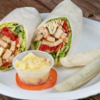 Manhattan Wrap · Tender grilled chicken & balsamic vinaigrette, topped with melted mozzarella, roasted pepper...