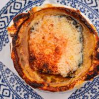 French Onion Soup · Gruyere cheese crouton.