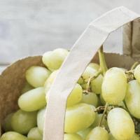 Green Seedless Grapes (1 Lb. Approx.) · Fresh salad with a variety of green vegetables typically served on a bed of lettuce.