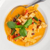Red Curry · Spicy level one. Red curry paste mixed with coconut milk with bamboo shoots, bell peppers, c...