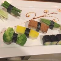 Vegetable Sushi Plate · Seven pieces of vegetable sushi and an avocado roll.