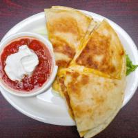 Duffy'S Cheese Quesadilla · 2 large flour tortillas stuffed with Monterey and Cheddar, jalapenos, Side of Salsa, and sou...